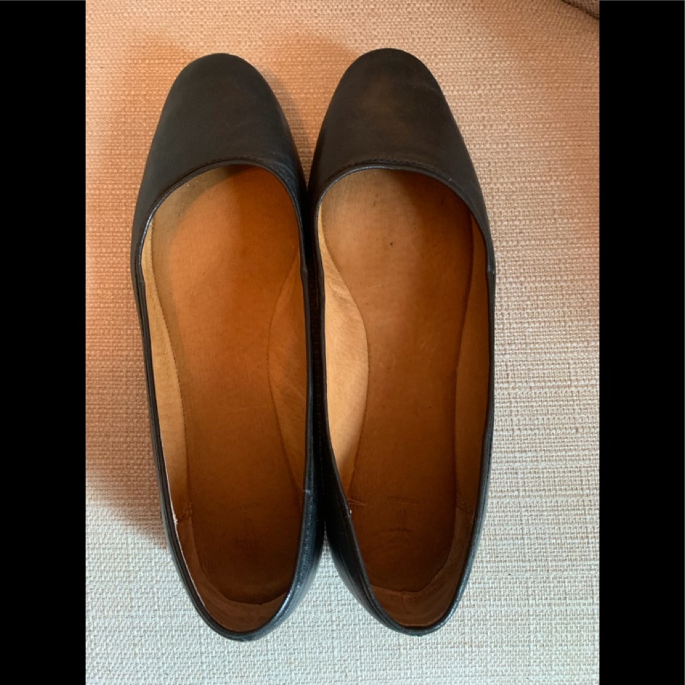Frye Black Leather flats.